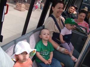 Grandma with Grandkids on the shuttle 