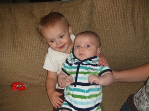 She loves to love on little brother.